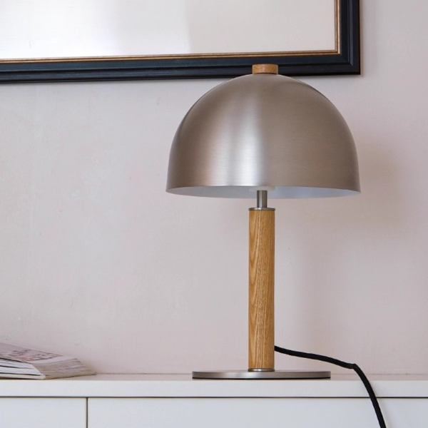 Table lamp with metallic shade and wooden base 