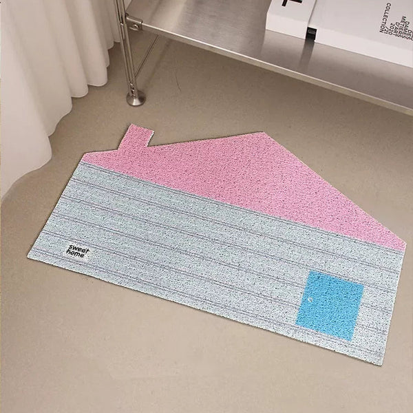 Multicolored rug on a floor with a Chanel book in the background