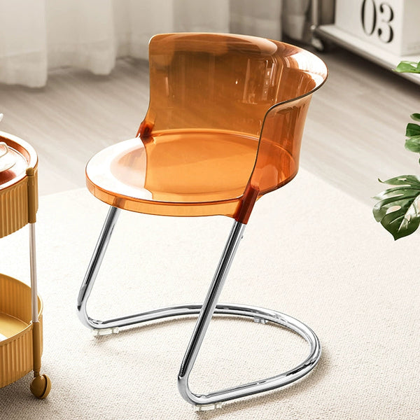 Orange transparent chair with metal legs in a room setting